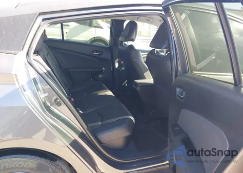 2022 Toyota Prius Prime Xle from USA, damaged, VIN JTDKAMFP7N3228469